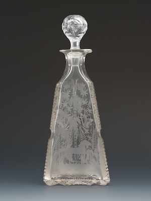 Appraisal: An Etched Crystal Perfume Bottle Tapering triangular shape with rounded