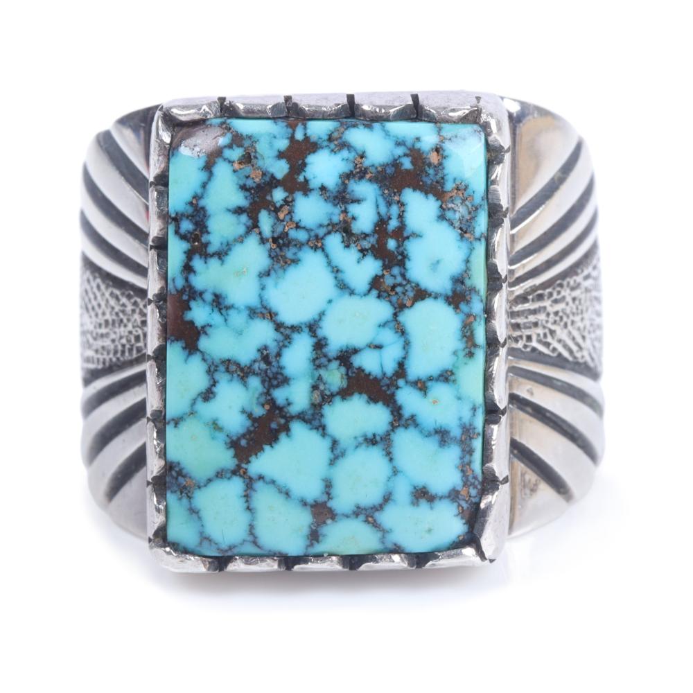 Appraisal: LEONARD NEZ NAVAJO NATIVE AMERICAN STERLING SILVER AND SPIDERWEB TURQUOISE