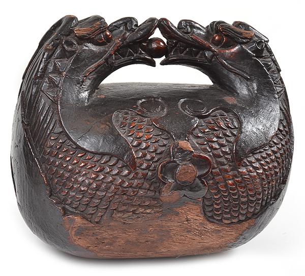 Appraisal: A PAINTED AND CARVED TEMPLE BELL with dragon decoration cm