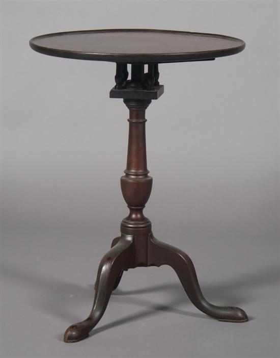 Appraisal: A Mahogany Tilt-Top Tea Table Height x width x depth