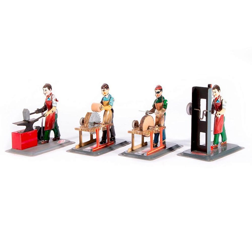 Appraisal: Four German toys Four vintage German Walesco machine worker toys