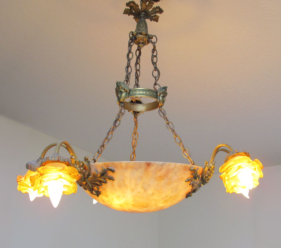 Appraisal: ALABASTER LIGHT CHANDELIER Alabaster dome shade with amber glass floral