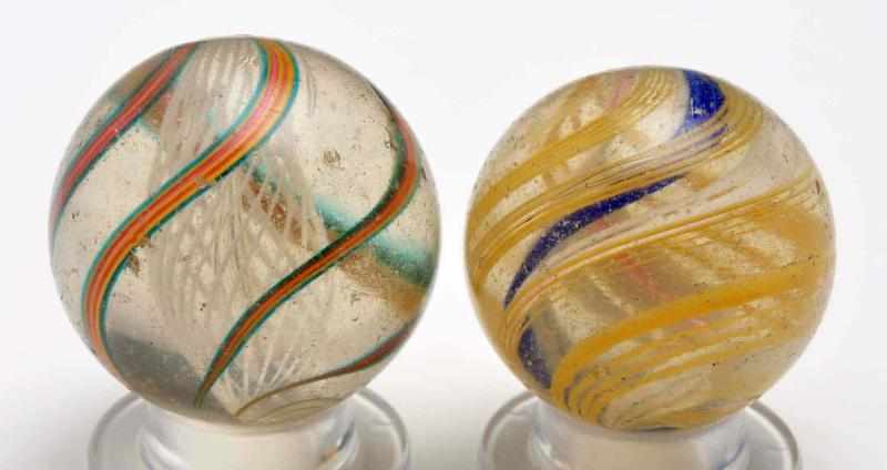 Appraisal: Lot of Swirl Marbles Description The smaller marble is a