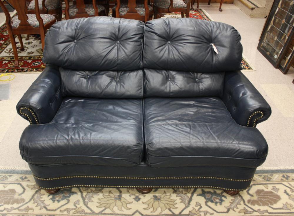 Appraisal: CONTEMPORARY BLUE LEATHER LOVESEAT with buttoned double-layer pillow back and