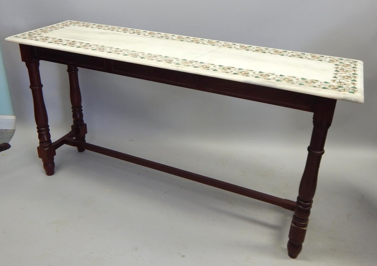 Appraisal: A mahogany serving table the rectangular marble top inlaid with