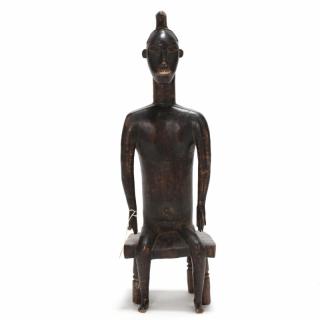 Appraisal: Ivory Coast Baule Guro Seated Figure carved wood applied dark