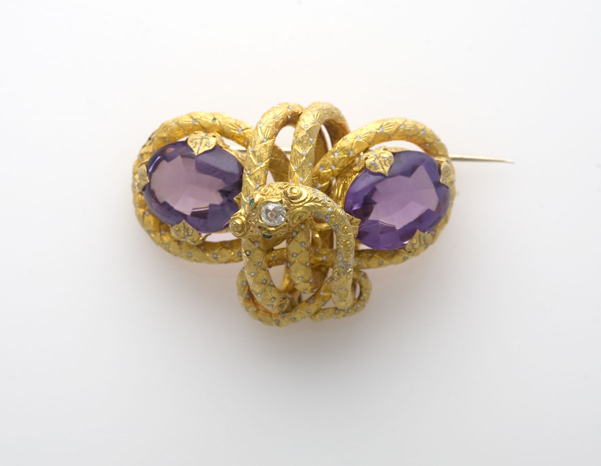 Appraisal: AMETHYST DIAMOND ENAMEL AND GOLD STYLIZED SNAKE BROOCH The antique