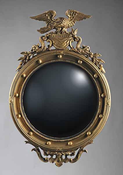 Appraisal: A Federal Revival Giltwood Bullseye Mirror c the crest with