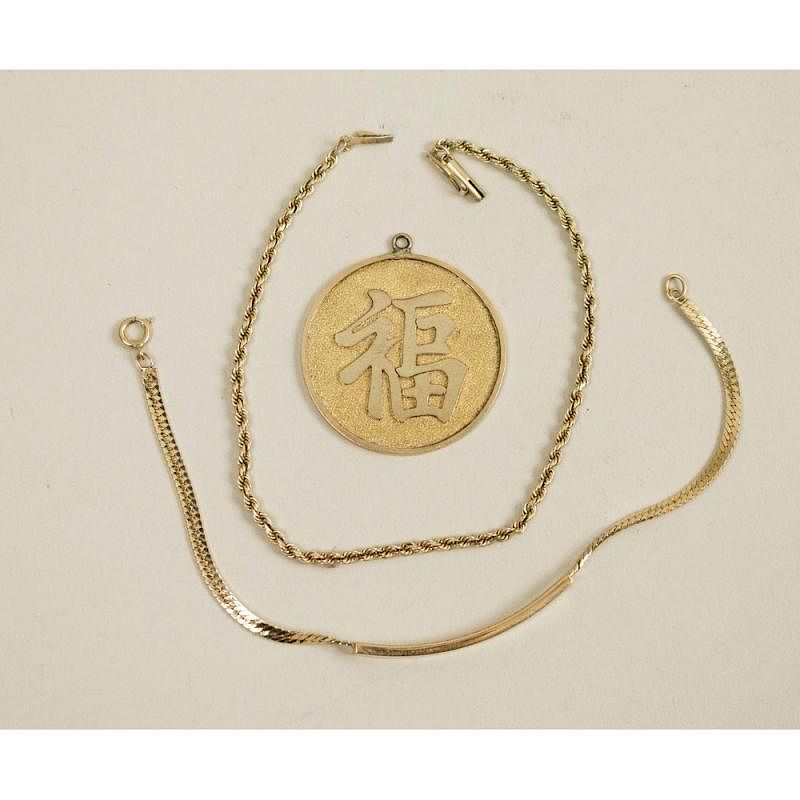 Appraisal: k Kanji Pendant Two k Bracelets Lot comprising a k