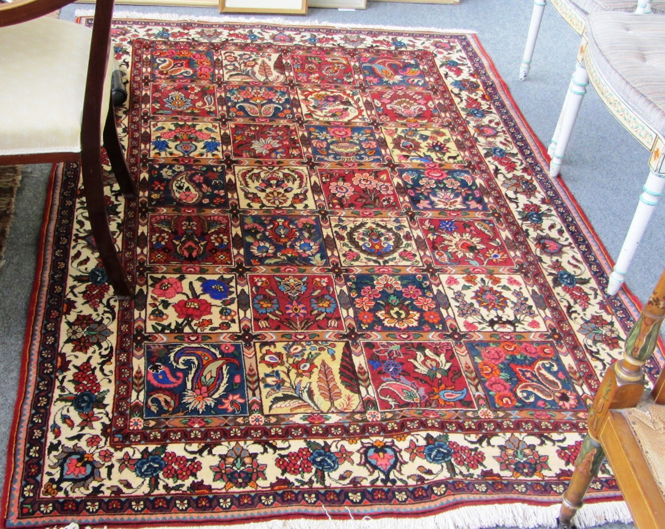 Appraisal: A Bakhtiari rug Persian the compartmented field with different floral