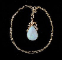 Appraisal: Opal Diamond Pendant K yellow gold frame and K yellow