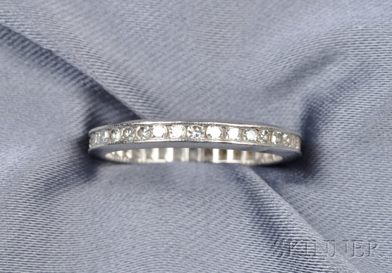 Appraisal: Platinum and Diamond Band channel-set with approx thirty-six single-cut diamond