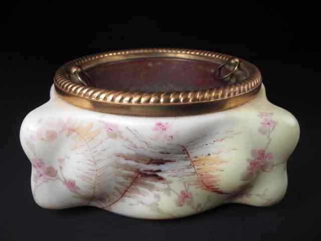 Appraisal: Wavecrest porcelain and brass cache pot Floral painted design on