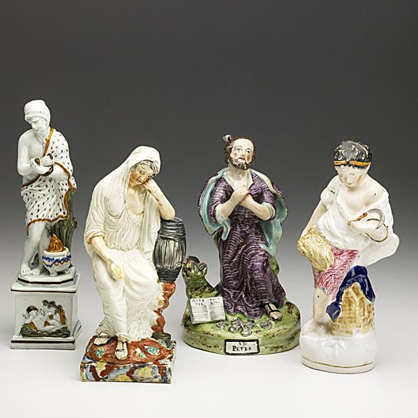 Appraisal: FOUR PORCELAIN FIGURESSt Peter snake charmer and two others th