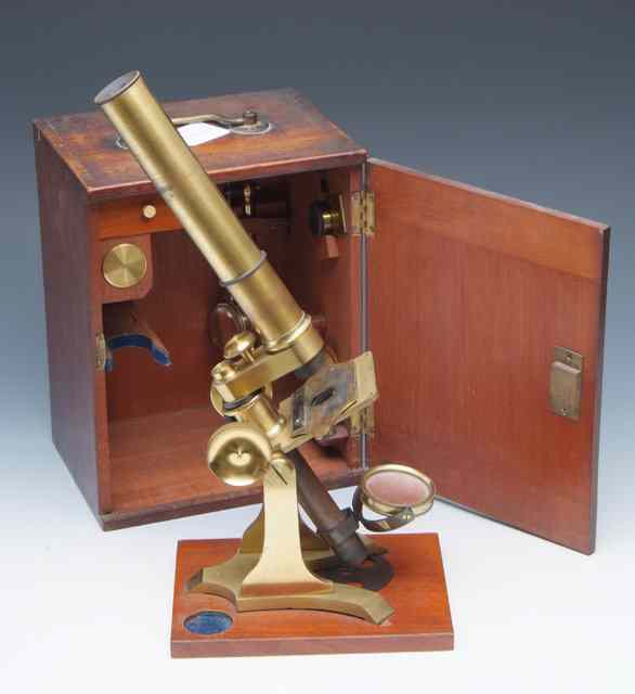 Appraisal: A TH CENTURY BRASS STUDENT'S MICROSCOPE with fitted case approximately