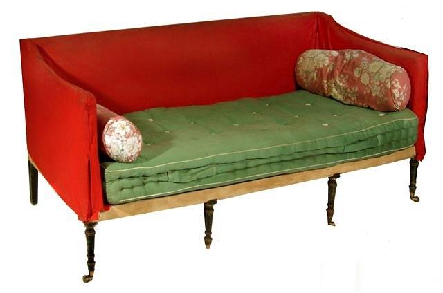 Appraisal: A George III three seater sofa with turned ebonised legs