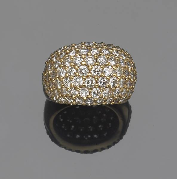 Appraisal: A diamond and k gold bomb ring estimated total diamond