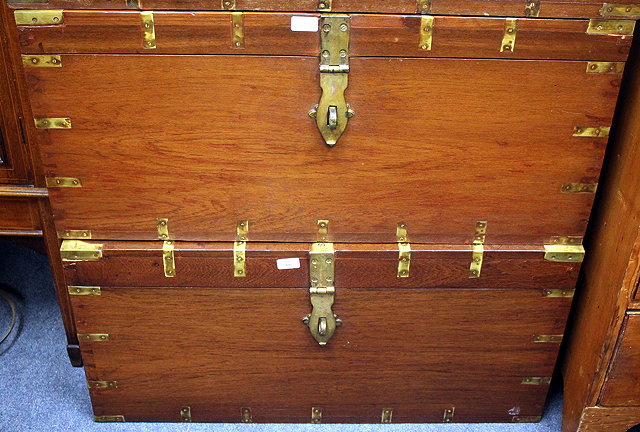 Appraisal: A NEAR PAIR OF TH CENTURY TEAK CAMPAIGN TRUNKS with