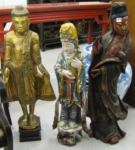 Appraisal: THREE CARVED WOOD FLOOR FIGURES H Kuan Yin with sceptre