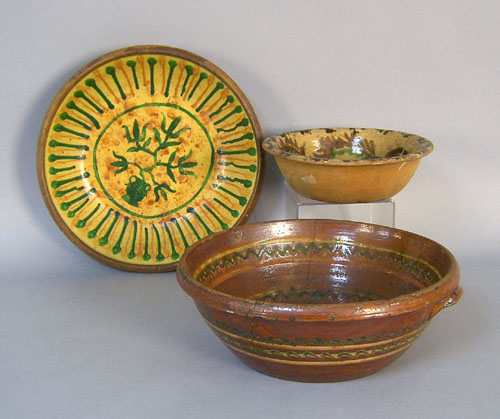 Appraisal: Three redware bowls th c one with later decoration h