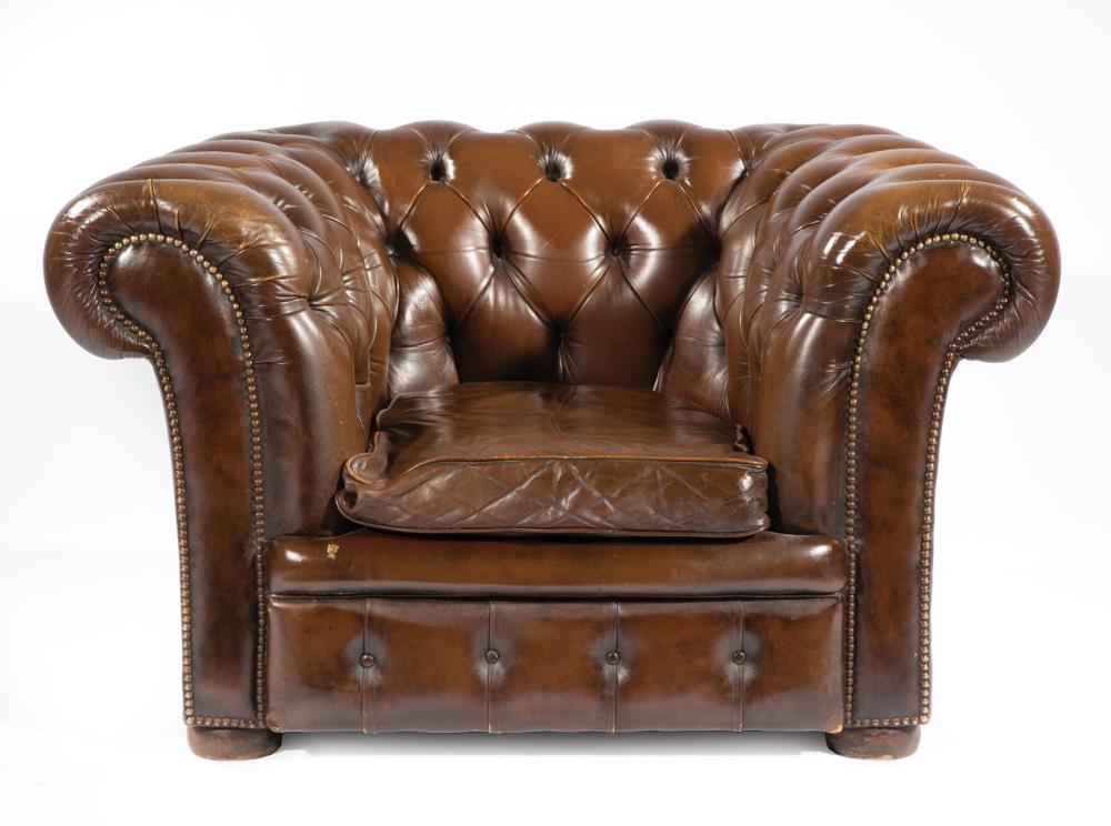 Appraisal: Chesterfield Leather Armchair button tufted back and arms loose seat