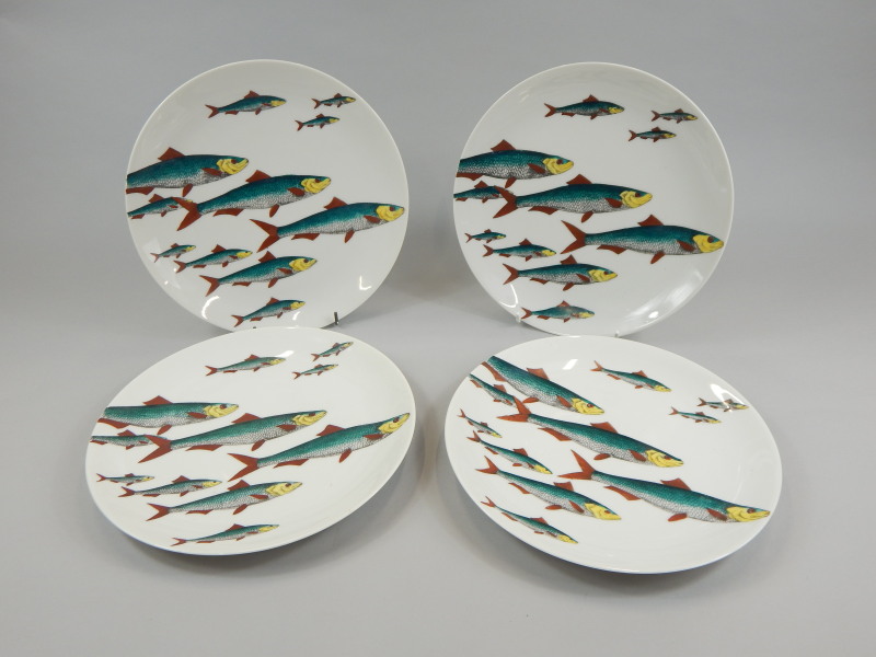 Appraisal: A set of four Fornasetti designed porcelain plates each printed