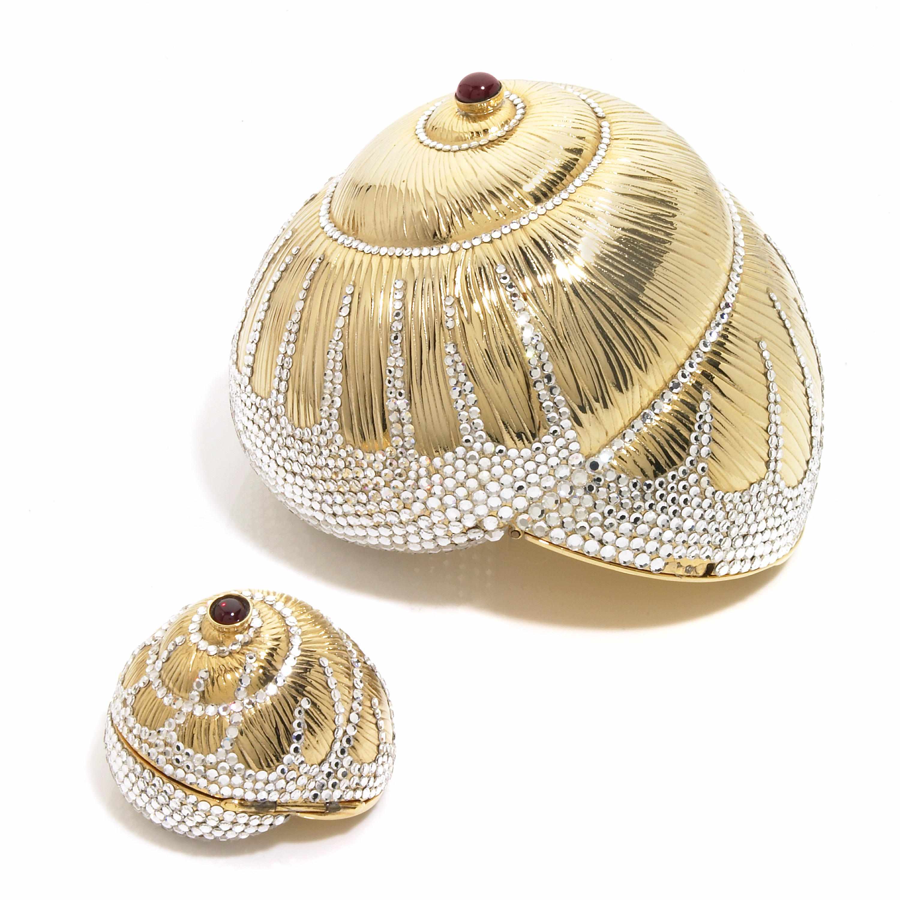 Appraisal: A gold colored metal and sem-precious stone shell purse with