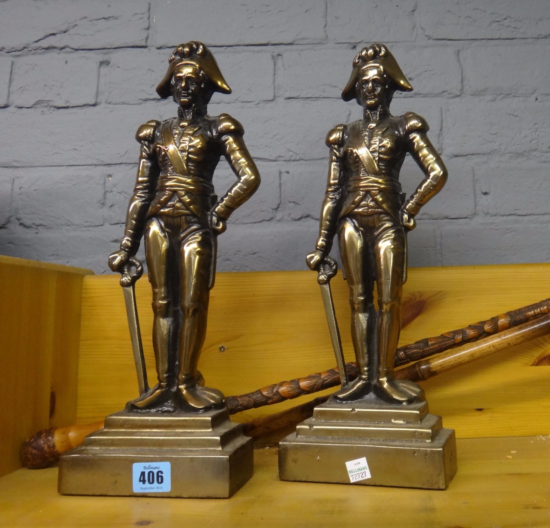 Appraisal: A pair of reproduction cast iron military figure door stops