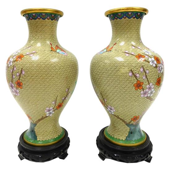 Appraisal: ASIAN Pair th C Chinese cloisonn vases on pierced lacquered