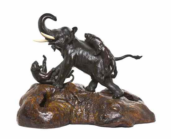 Appraisal: A Japanese Bronze Model of an Elephant and Tigers with