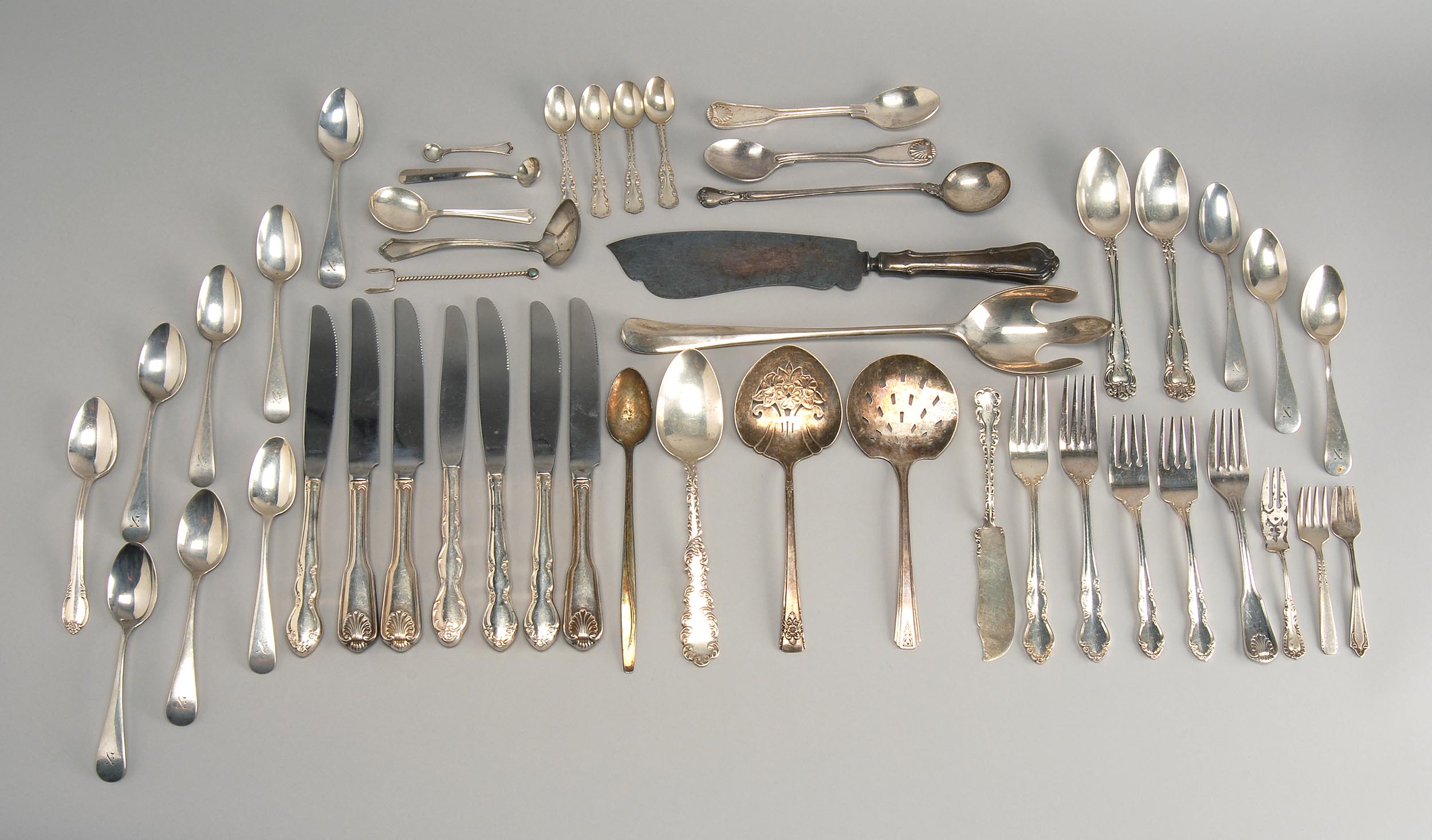 Appraisal: FORTY-SIX PIECES OF STERLING SILVER AND SILVER PLATED FLATWARE by