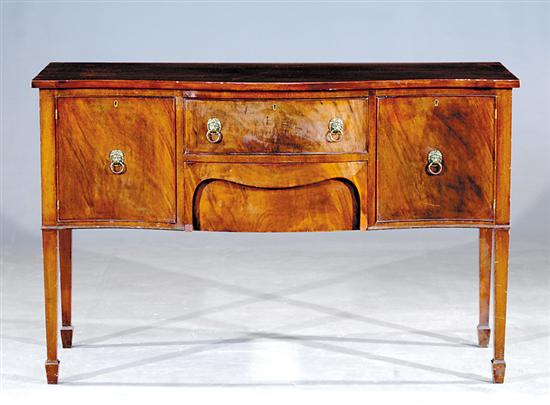 Appraisal: Georgian style mahogany serpentine sideboard late th century shaped top