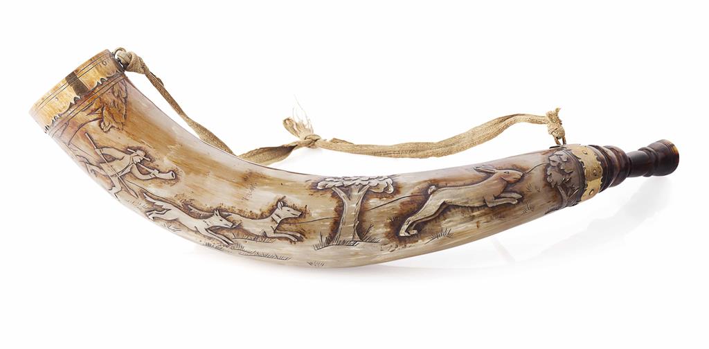 Appraisal: CARVED HUNTING HORN the polished horn with a deeply carved