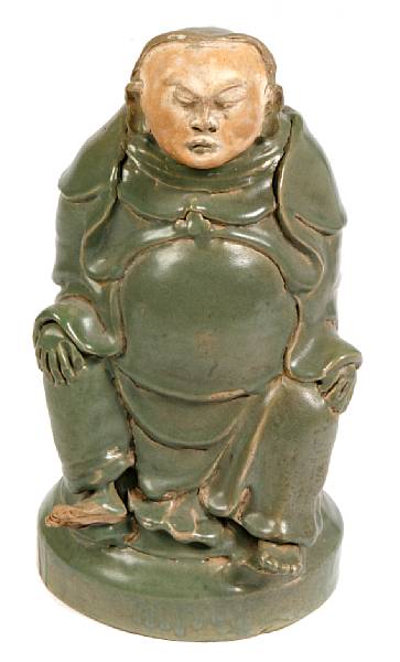 Appraisal: An Asian style celadon glazed pottery seated figure height in