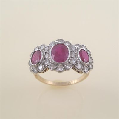 Appraisal: A ruby and diamond triple cluster ring the three graduated