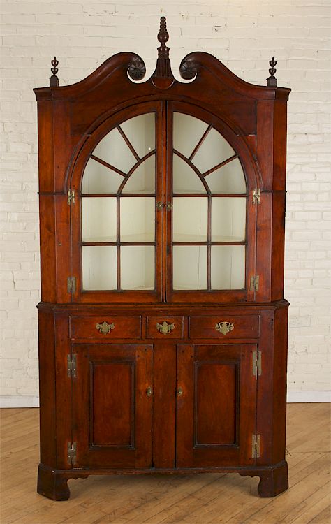 Appraisal: AMERICAN WALNUT CHIPPENDALE CORNER CABINET C A two piece American