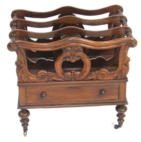 Appraisal: A Victorian rosewood Canterbury with a foliate scroll three division