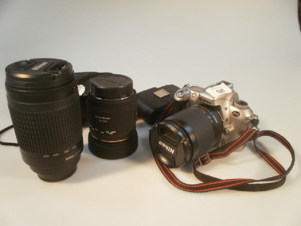 Appraisal: A Nikon F camera in a case a Samsung slim