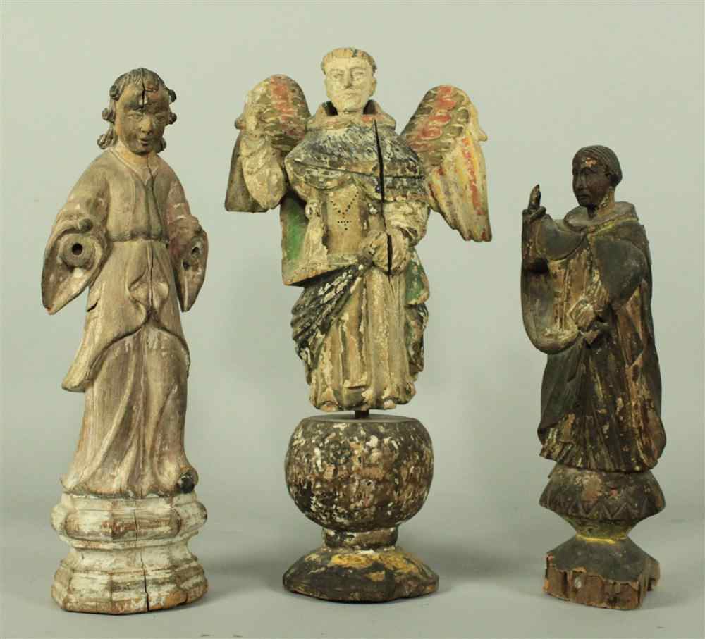 Appraisal: THREE SPANISH COLONIAL POLYCHROMED WOOD SANTOS FIGURES TH TH CENTURY