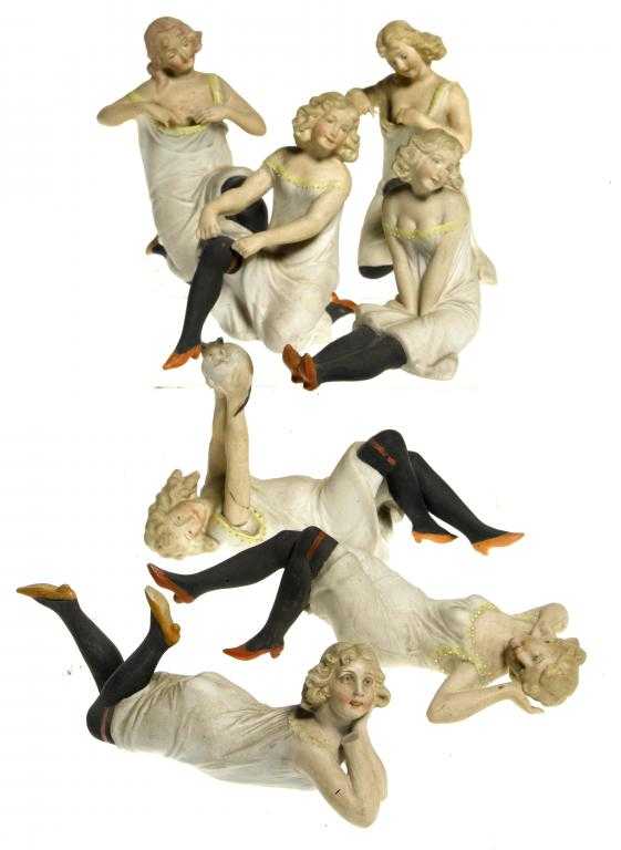 Appraisal: SEVEN SIMILAR CONTINENTAL PAINTED BISCUIT PORCELAIN 'RISQU ' FIGURES OF