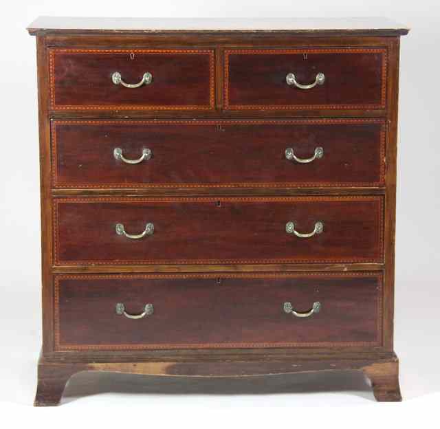 Appraisal: An Edwardian mahogany chest of two short and three long