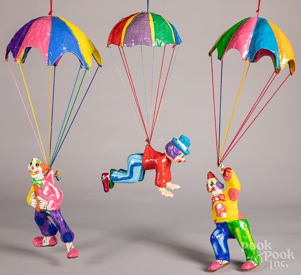 Appraisal: Set of painted Papier-m ch clowns Set of painted Papier-m