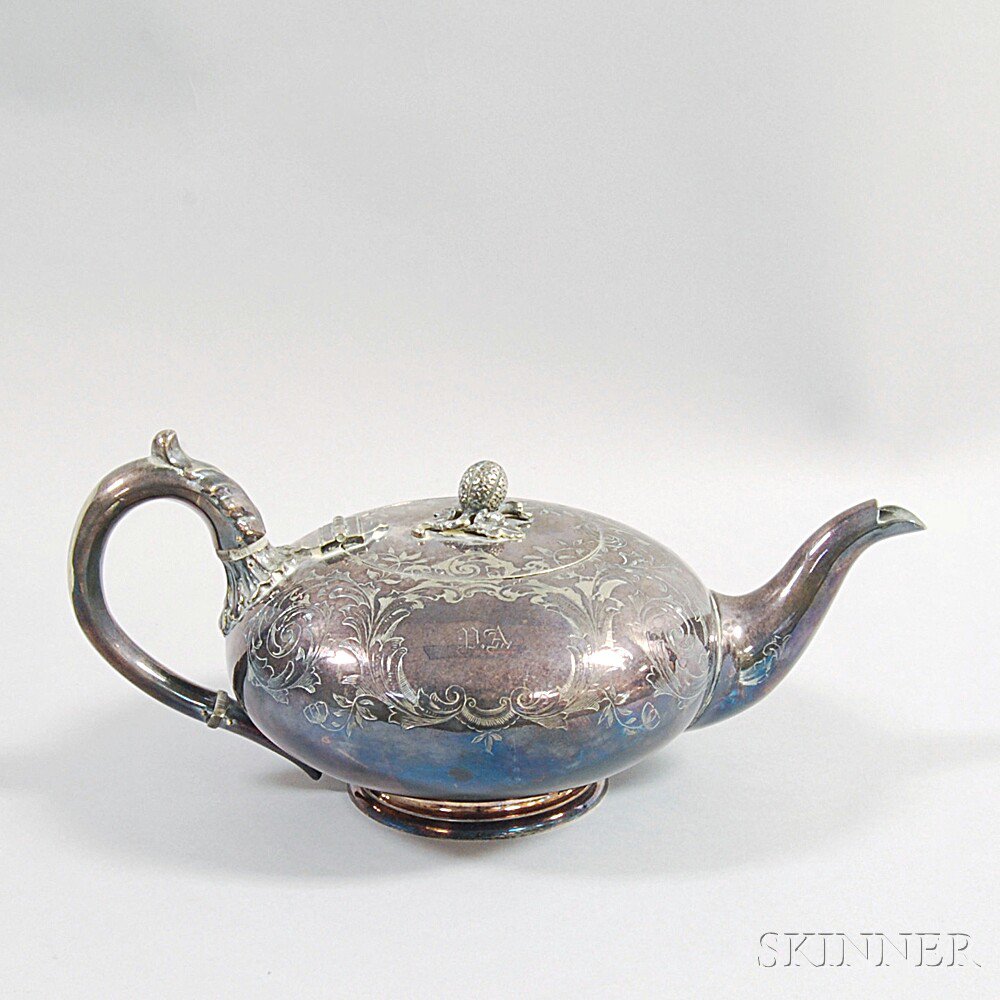 Appraisal: Elkington Mason Co Silver-plated Teapot with overall engraved foliate decoration