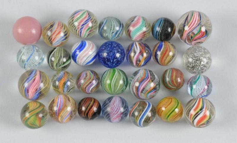 Appraisal: Assortment of Handmade Marbles Description Includes approximately marbles most with