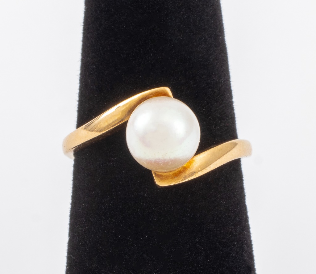 Appraisal: MIKIMOTO K YELLOW GOLD PEARL BYPASS RING Mikimoto K yellow