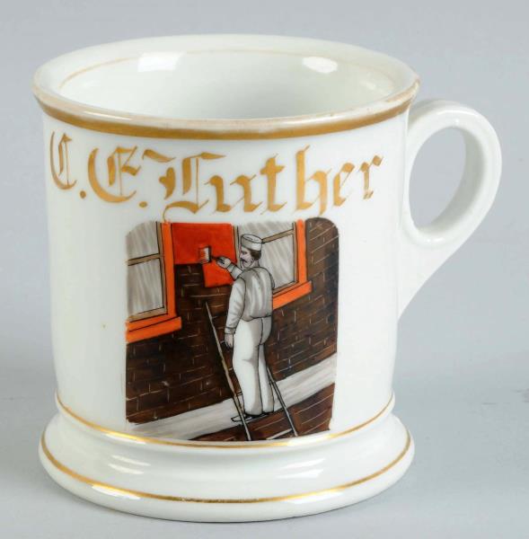 Appraisal: House Painter Shaving Mug Mug shows a man painting a