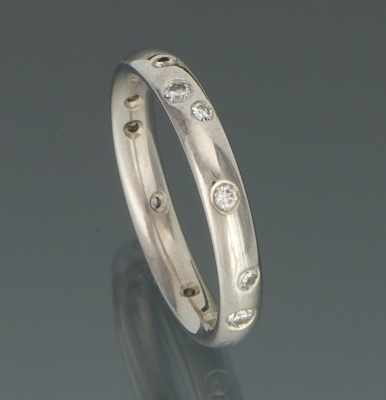 Appraisal: A Ladies' Platinum and Diamond Etoile Band Platinum band set