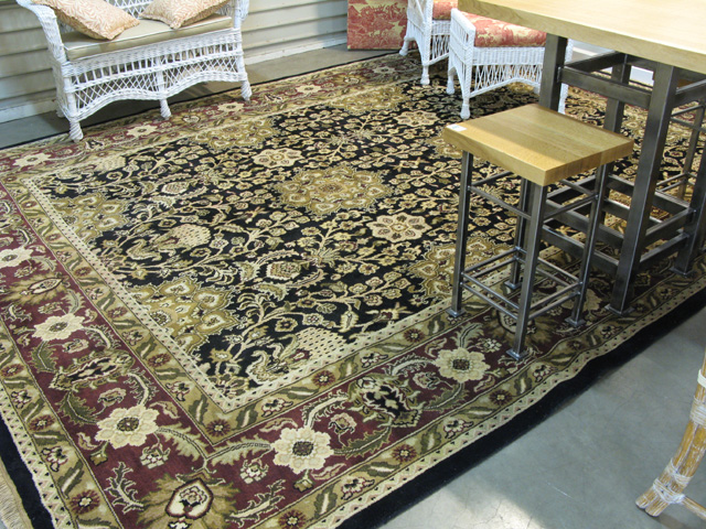 Appraisal: HAND KNOTTED ORIENTAL CARPET Indo-Persian double medallion and overall floral