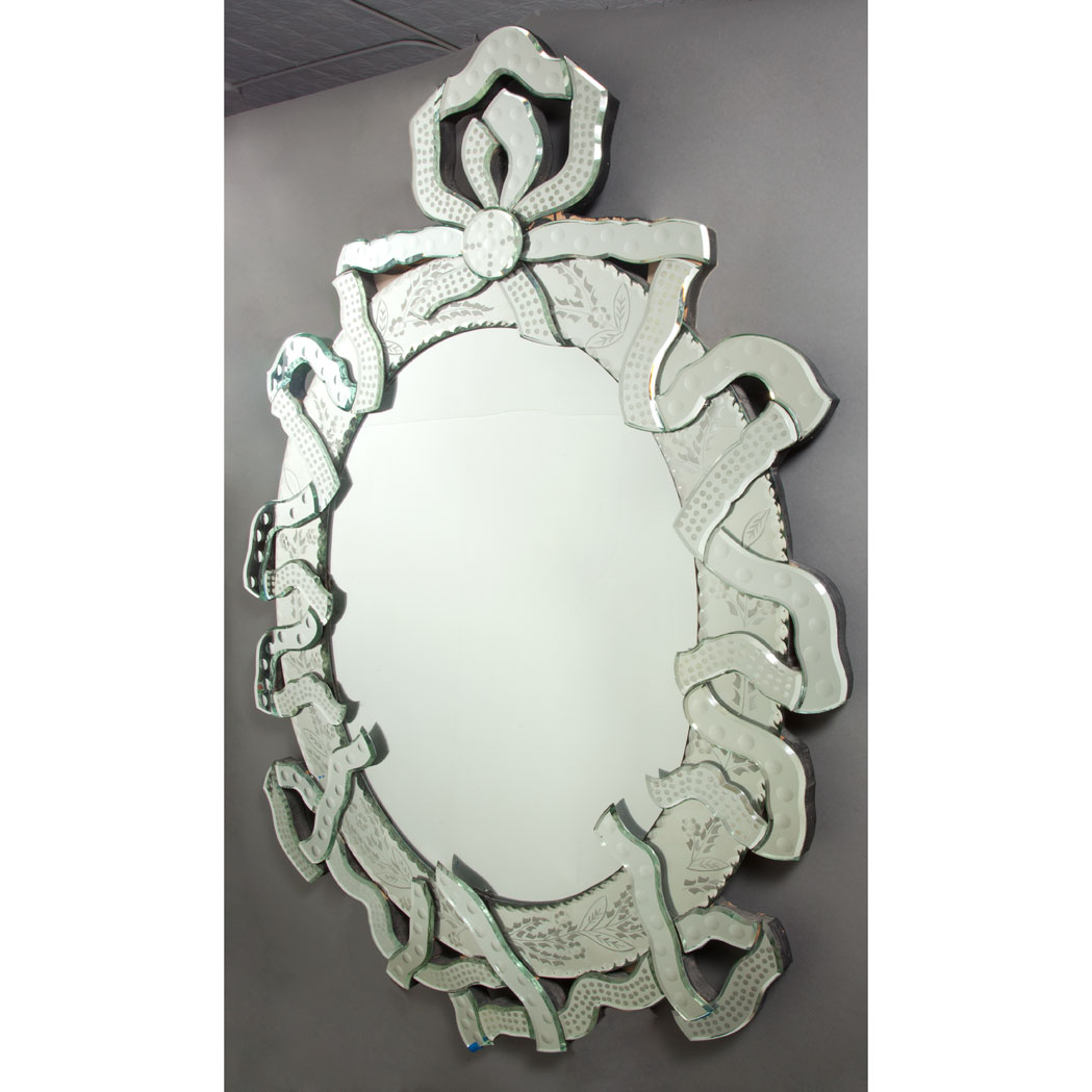 Appraisal: Venetian Style Mirror Framed Mirror Modern Of oval form surmounted