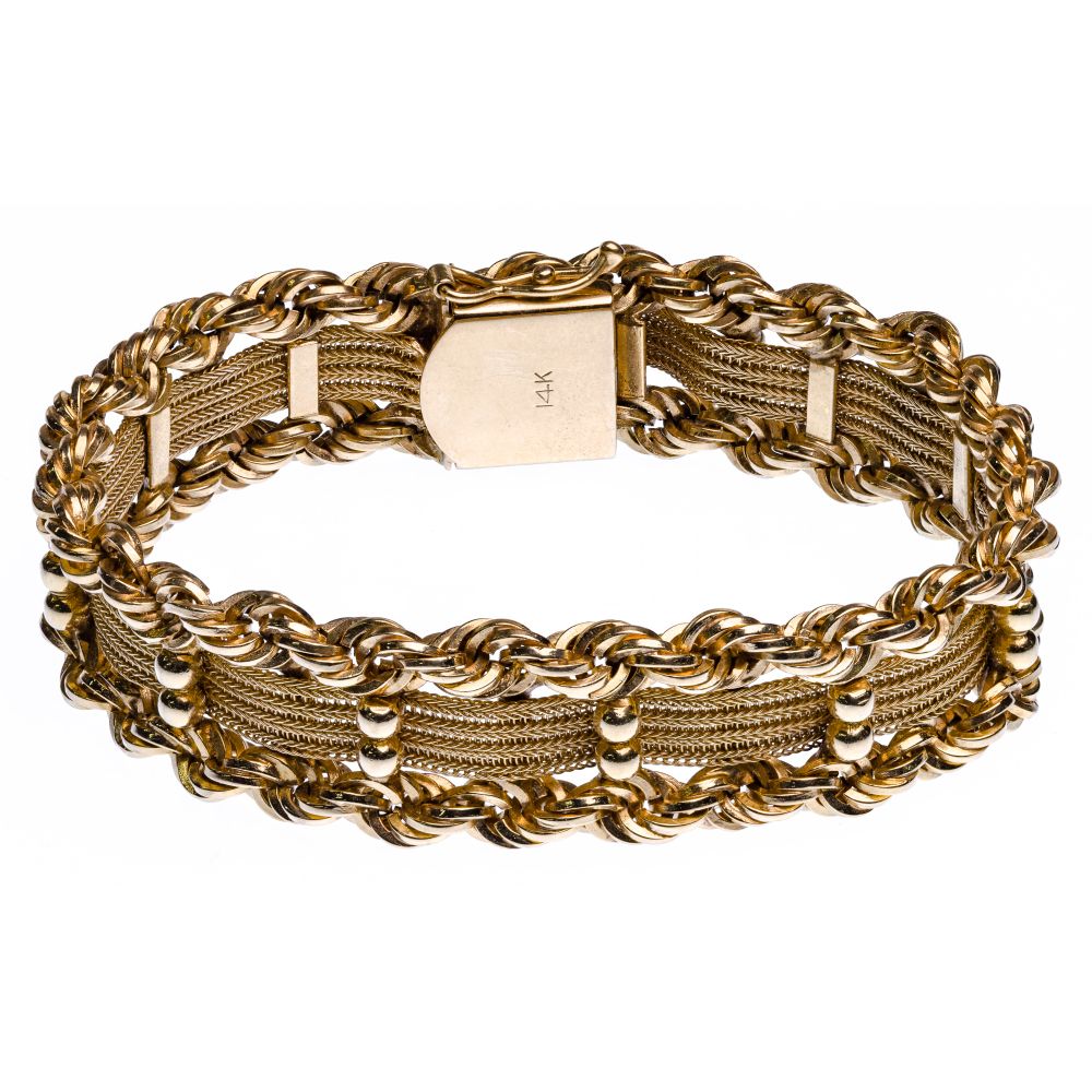 Appraisal: K YELLOW GOLD BRACELETWoven design having a mesh center flanked